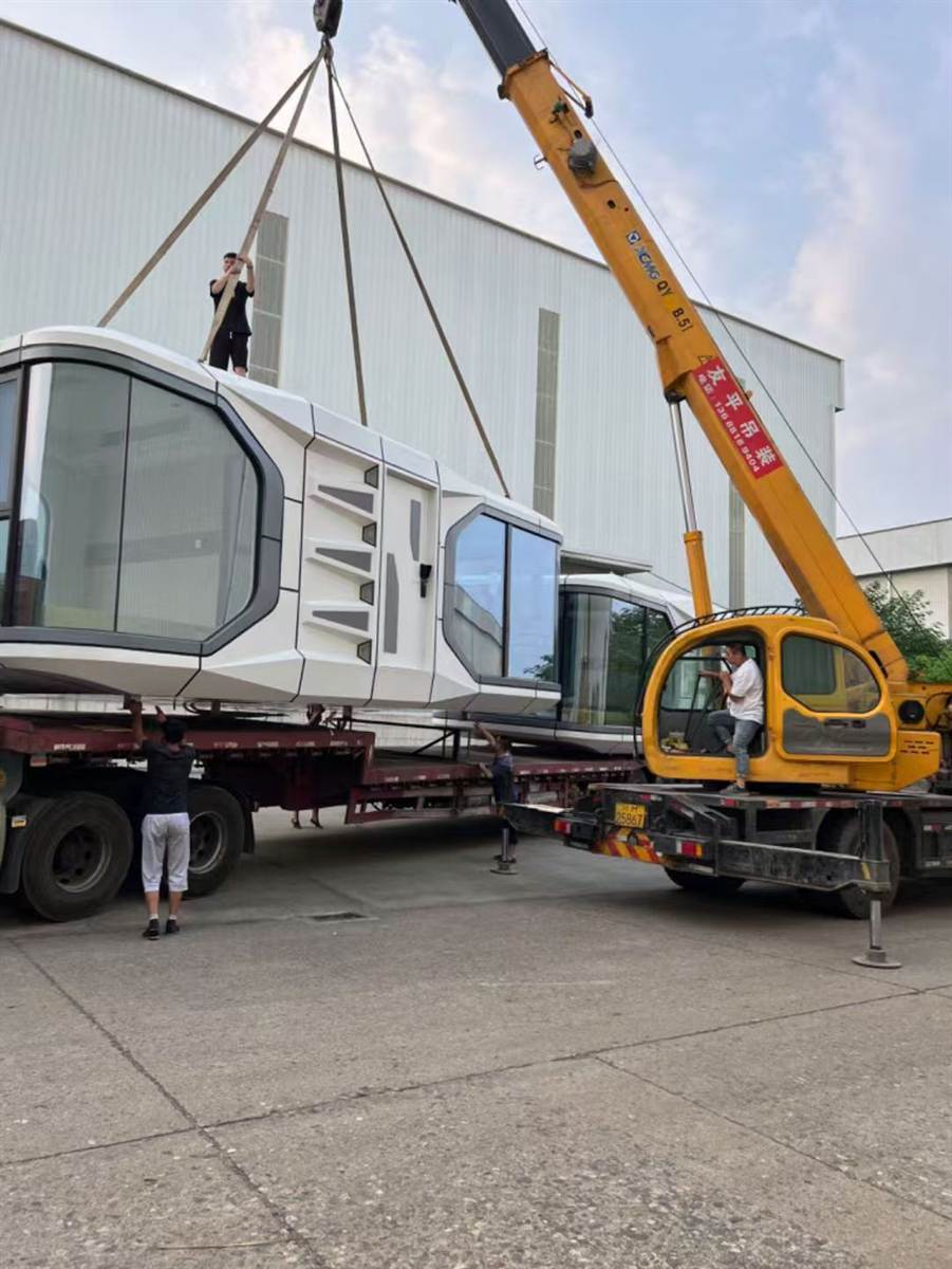 Space capsule cabin lifting from truck