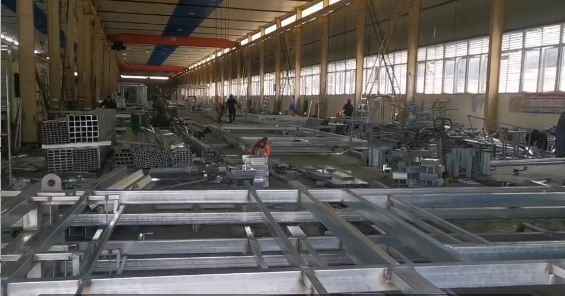 Metal base and frame assemblies for modular building production
