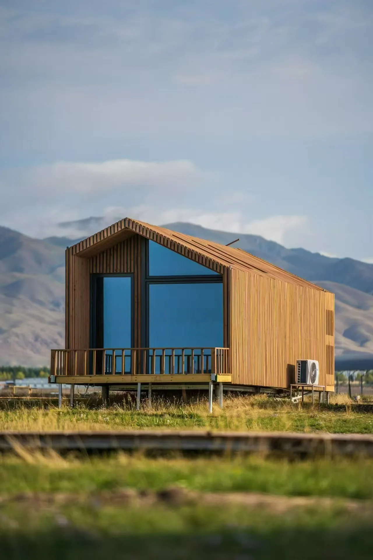GL-PRODUCT-001 candidate showing a real wood-finished lodge exterior