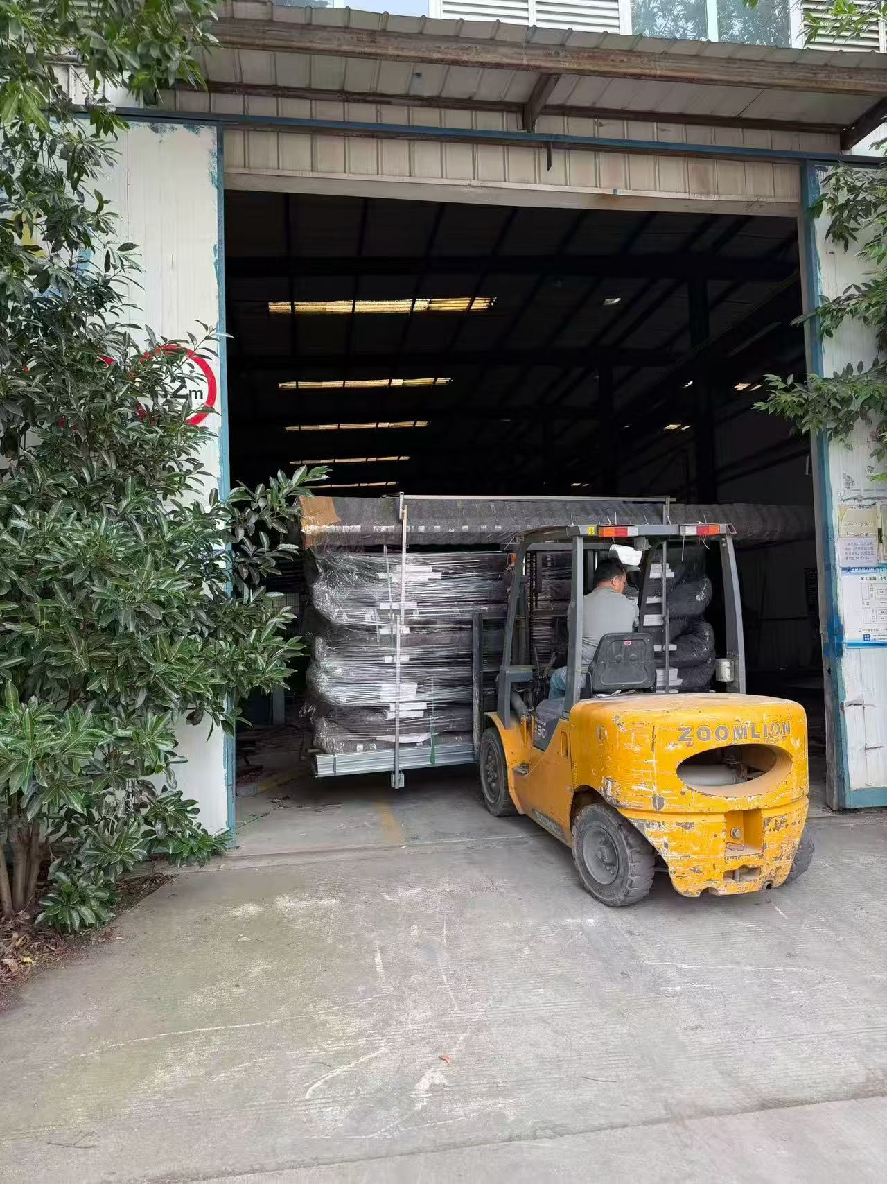 Prefab building packing preparation near the factory entrance