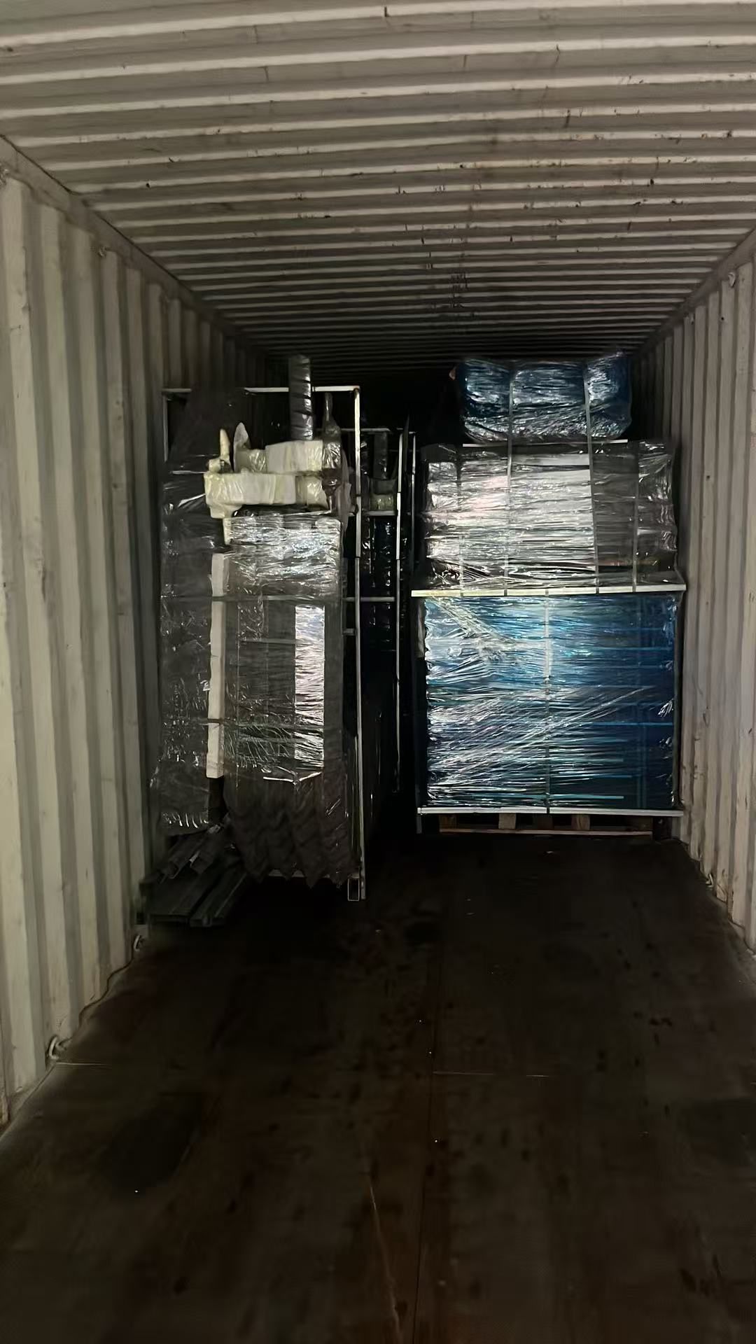 Packed prefab cabin cargo inside a container