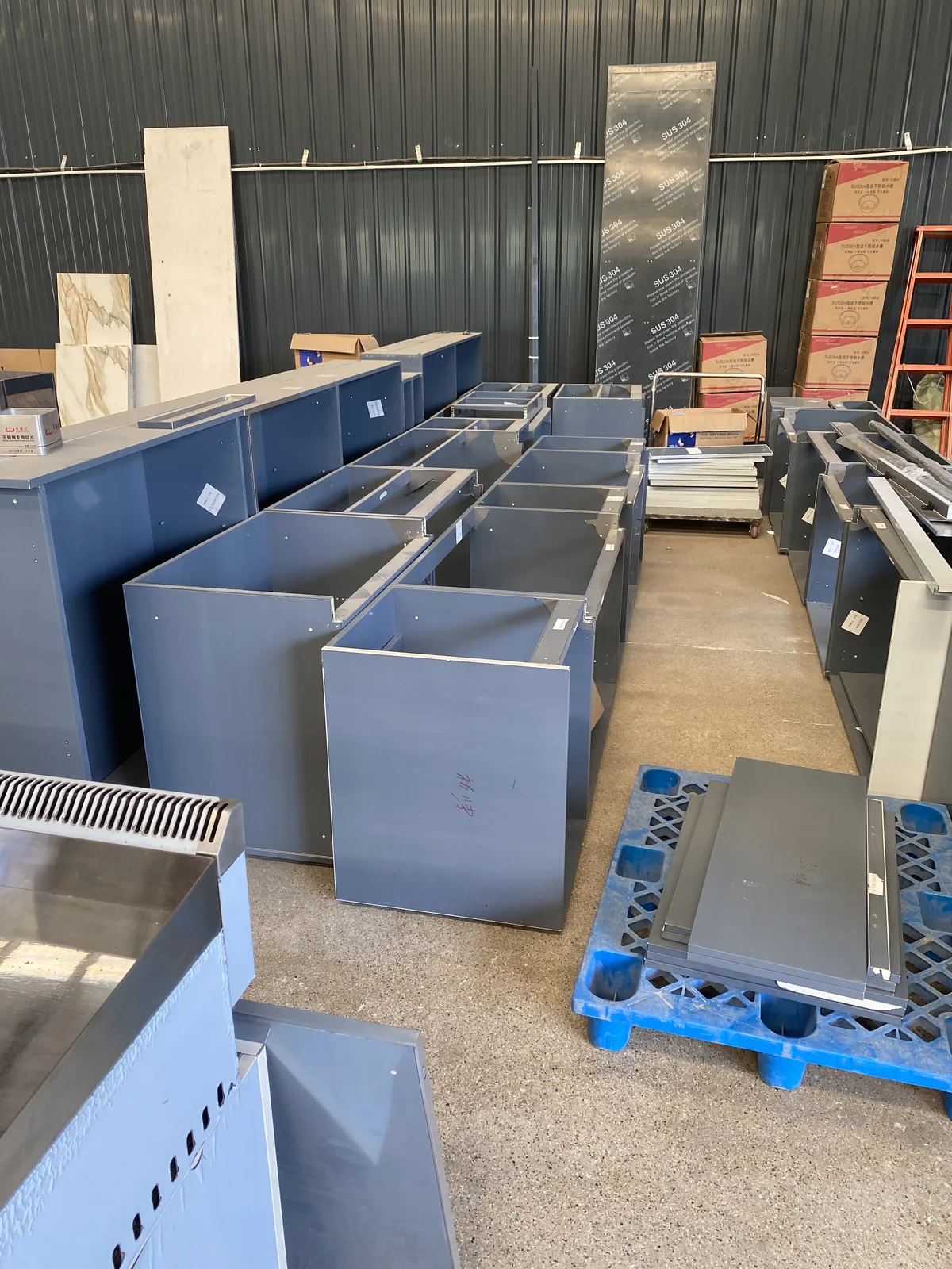 Outdoor kitchen cabinet modules preassembled in the factory