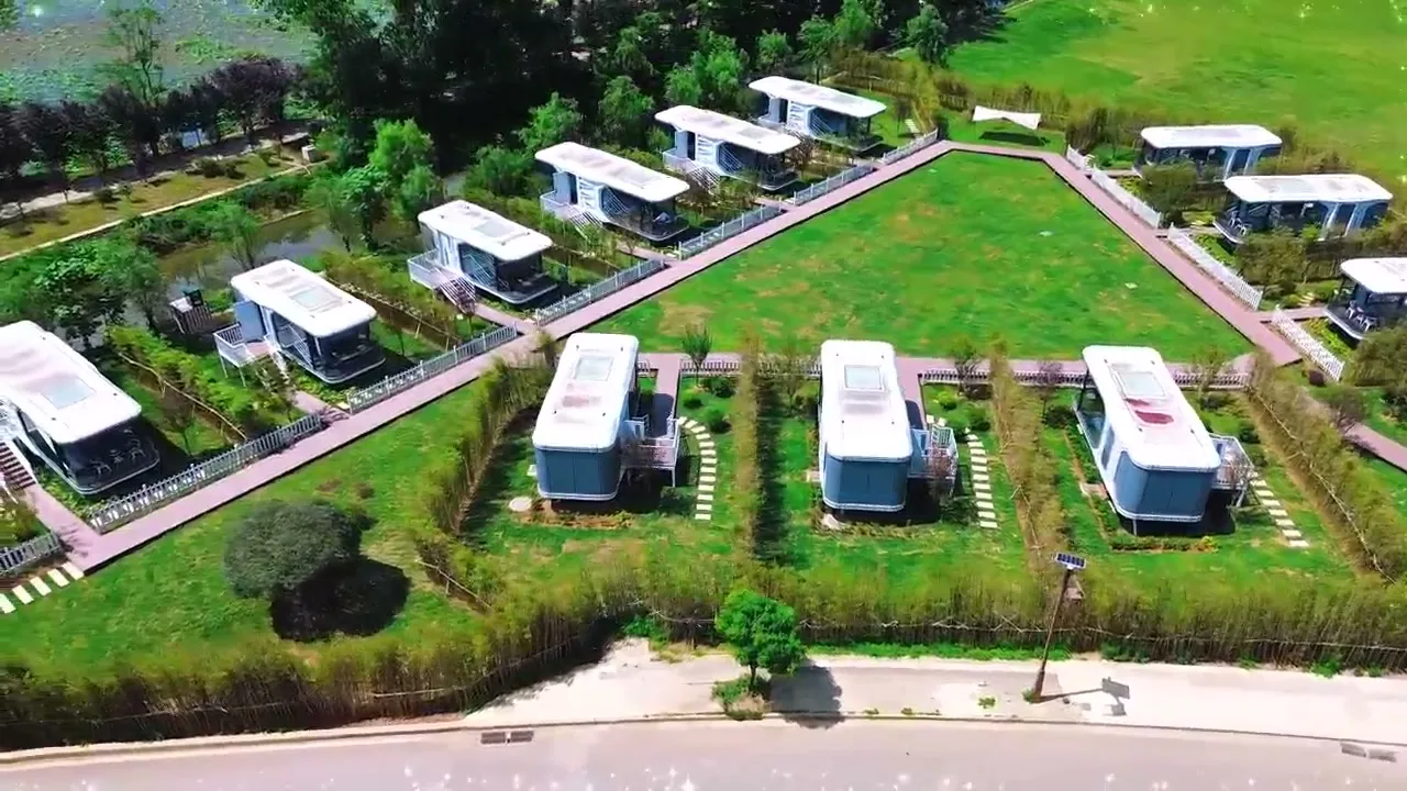 Multiple space capsule cabins arranged across a shared outdoor site